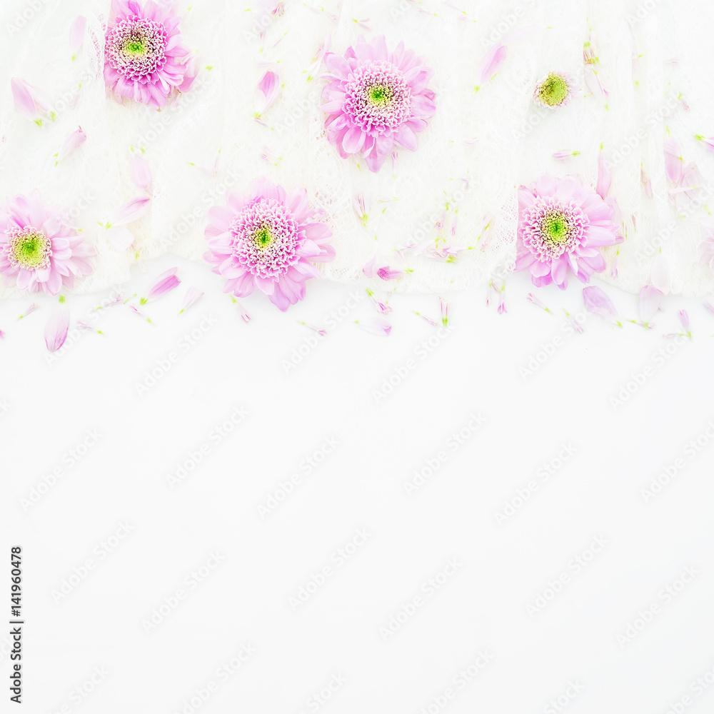 Pink flowers, petals and cloth on white background. Wedding dress. Flat lay, top view. Woman's background