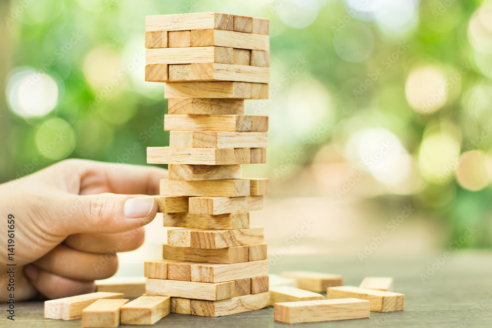 Wood blocks stack game ,Planning, risk and strategy, business background concept. Wood blocks stack game ,Planning, risk and strategy, business background concept.