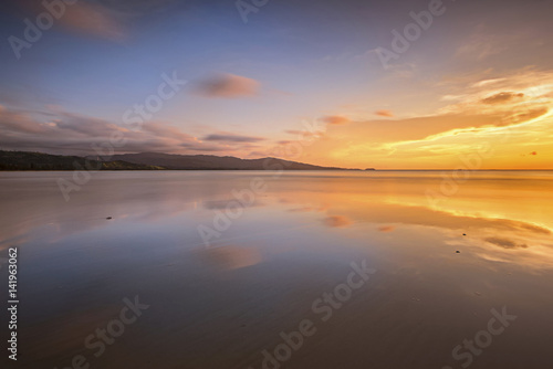 Beautiful beach sunset scenery  © joulesorubou