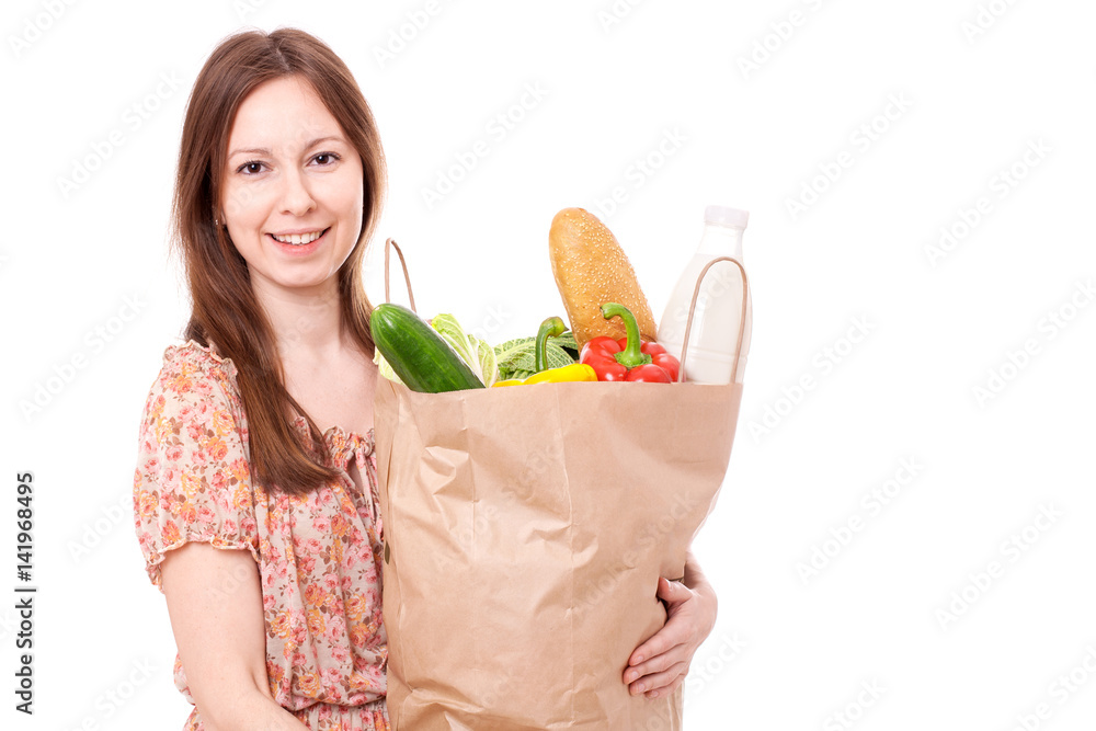 Young Woman Holding Large Bag of Healthly Groceries Young Woman Holding Large Bag of Healthly Groceries