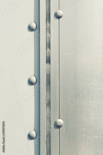 riveted metal plate background