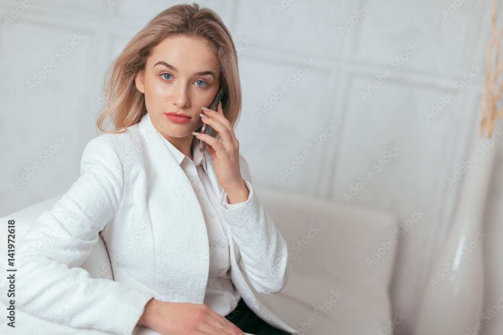 Portrait of beautiful young woman working in the office. Portrait of beautiful young woman working in the office.