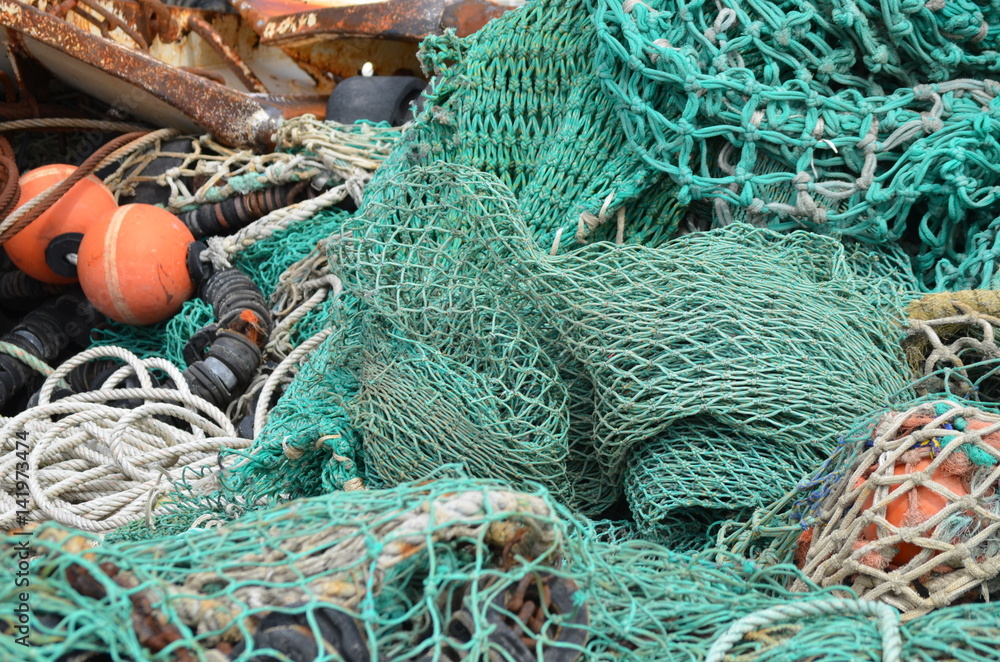 colorful fisherman's nets and traps on a dock colorful fisherman's nets and traps on a dock