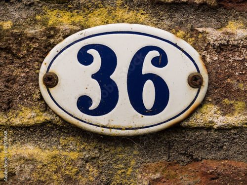 enameled old house number 36