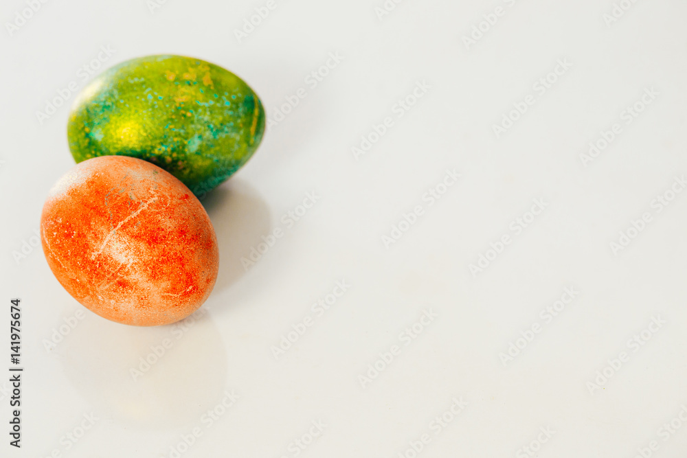 Red and green Easter eggs on white background. Red and green Easter eggs on white background.