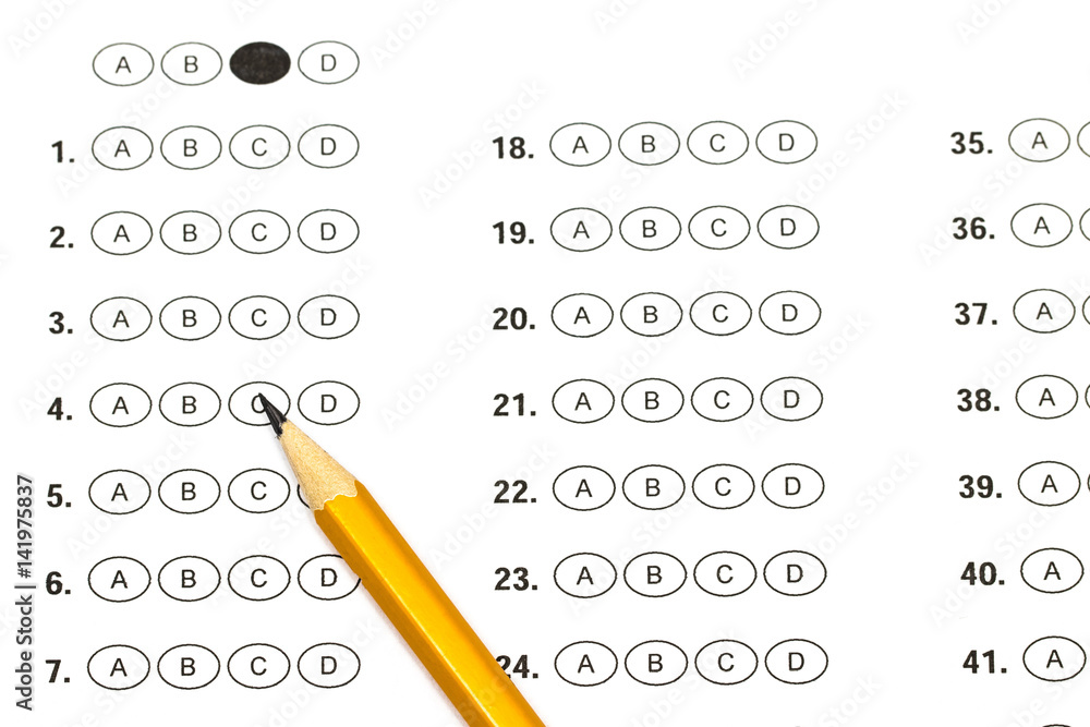 Test score sheet with answers and pencil
