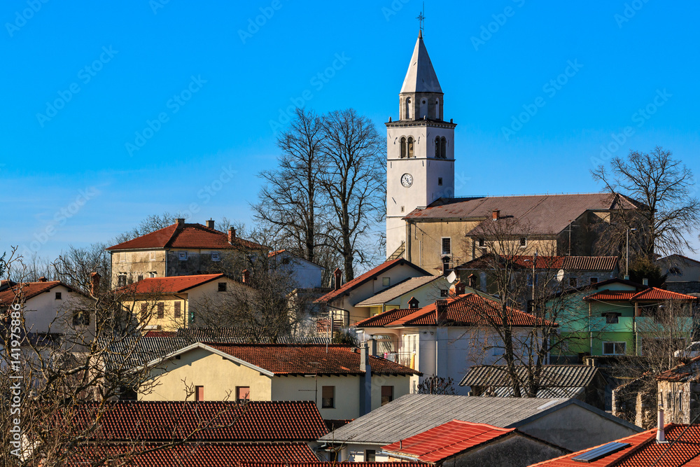Typical old Istrian village Hrusica on a hill in winter, Slovenia