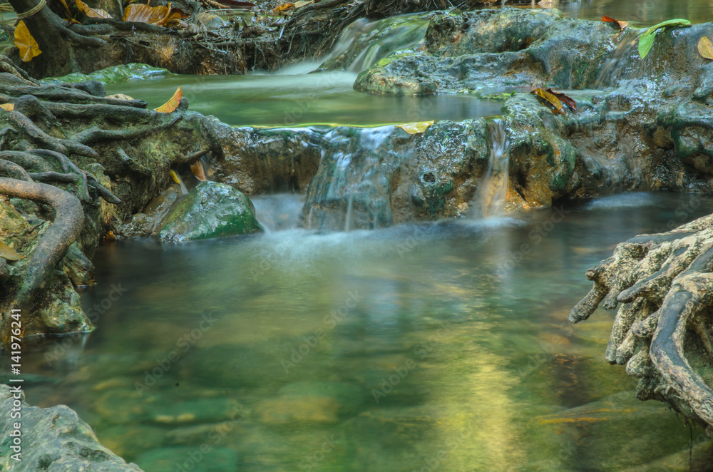 Fototapeta premium Nature waterfall in deep forest