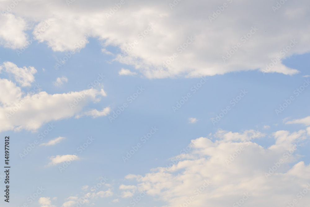 White fluffy clouds in blue sky and copyspace for backgrounds White fluffy clouds in blue sky and copyspace for backgrounds