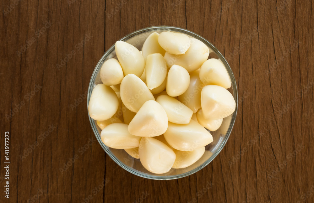 garlics close up  in top view on table wood background.