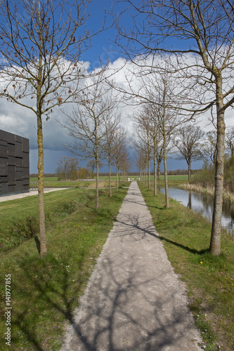 Lane with trees at Museum Belvédère. Ornajewoud Heerenveen Friesland Netherlandsn Friesland Netherlands. Lane with trees.  photo