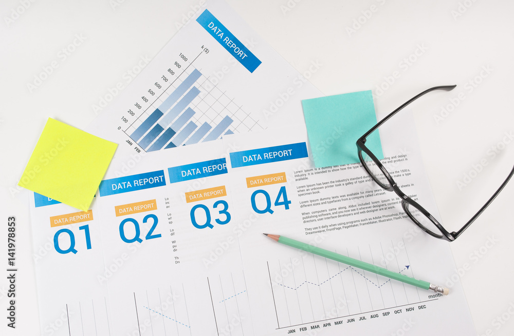 Documents with chart and graph and sticky note as a background. Business concept. Documents with chart and graph and sticky note as a background. Business concept.