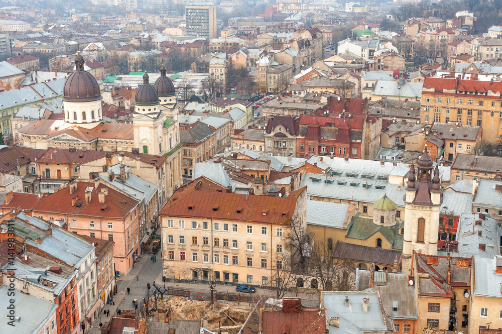 Market Square and surrounding historic buildings in the center of old Lvov, Ukraine
