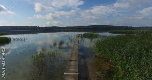 Wallpaper Mural Lake landscape with cloud reflections, wooden bridge Torontodigital.ca