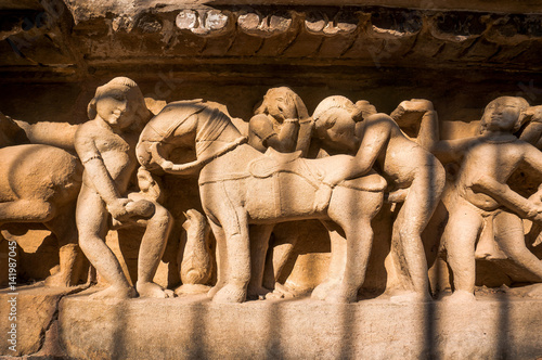 Famous erotic stone carving bas relieves, Lakshmana Temple, Khajuraho, India.