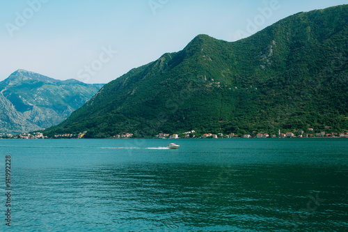 Boat in the Bay of Kotor. Montenegro  the water of the Adriatic Sea. Boats  yachts  liners.
