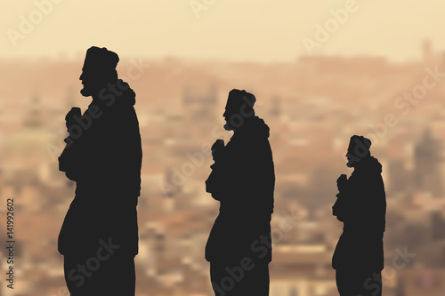Religious middle ages historical statues with the antique city as background, vector illustration