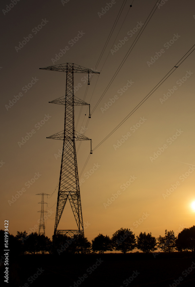 electric pylon in sunset