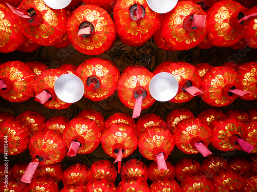 Chinese red lanterns hang for decorate the ceiling inside temple