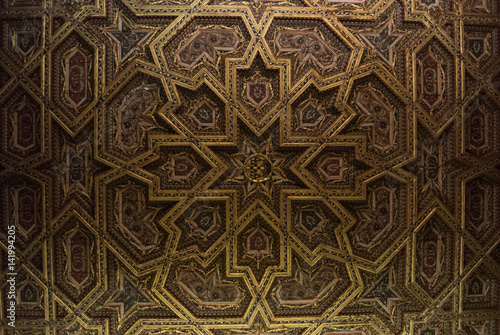TOLEDO, SPAIN - FEBRUARY 8, 2017: A ceiling of the Primate Cathedral of Saint Mary of Toledo, decorated with dragons' heads and stars, Castilla-La Mancha, Spain.