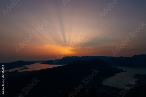Sunset in the mountains. Sunset in the Montenegrin mountains. Sun to sit down behind the mountains.