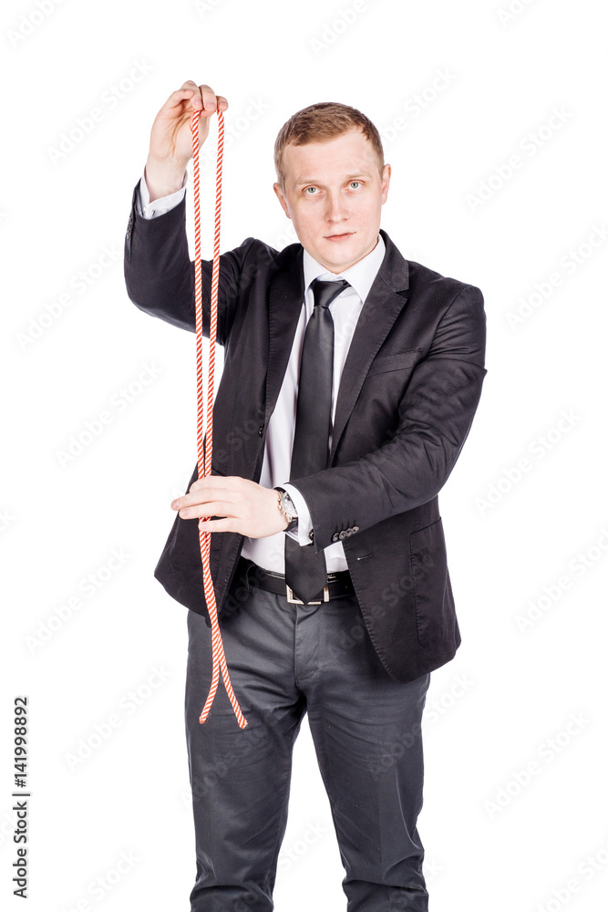 smiling businessman. holding rope for magic trick isolated against white background. business, people and magic concept. smiling businessman. holding rope for magic trick isolated against white background. business, people and magic concept.