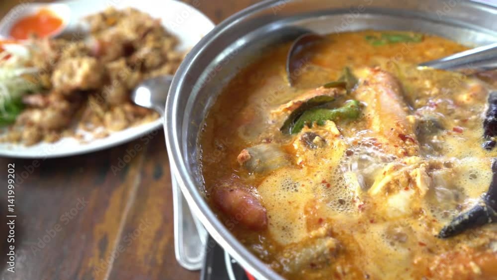 Thai hot spicy soup with prawn boiled in pot Thai hot spicy soup with prawn boiled in pot