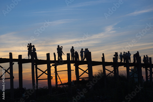 Fototapeta Naklejka Na Ścianę i Meble -  Sunset on U Bein Bridge, Amarapura, Myanmar Burma