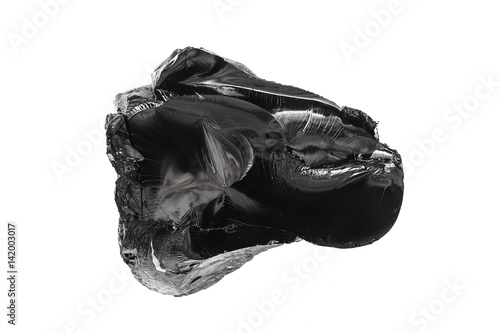 Photos Bitumen, a piece of black resin on a white background