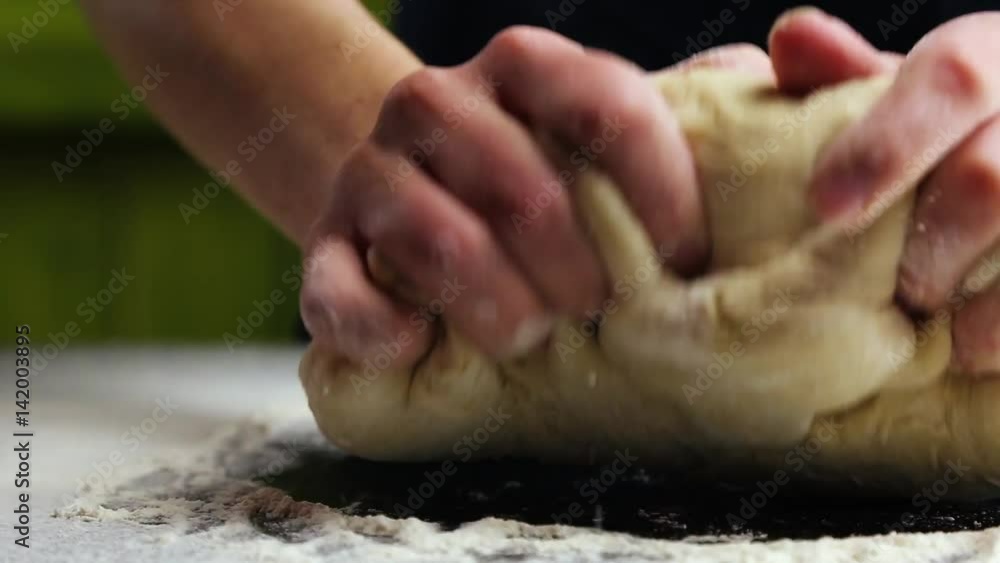 kneading the dough by hand kneading the dough by hand