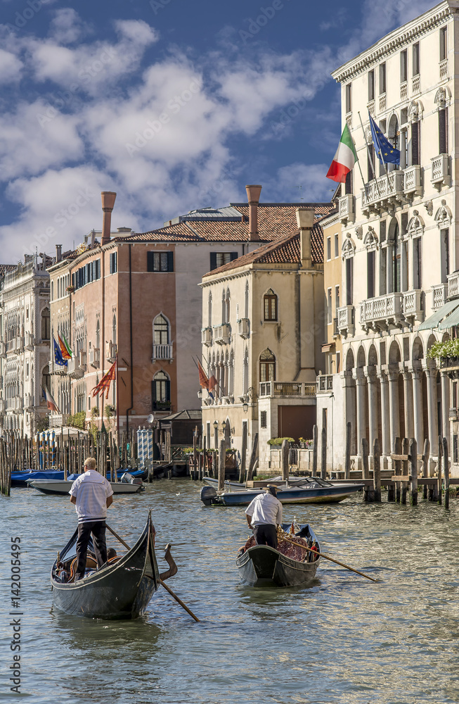 Two gondolas near the Palazzo Michiel dalle Colonne, a palace in Venice, Italy, located in the Cannaregio district and overlooking the Grand Canal