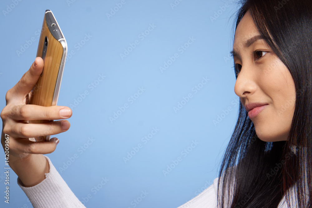 beautiful brunette, touch phone in hand beautiful brunette, touch phone in hand