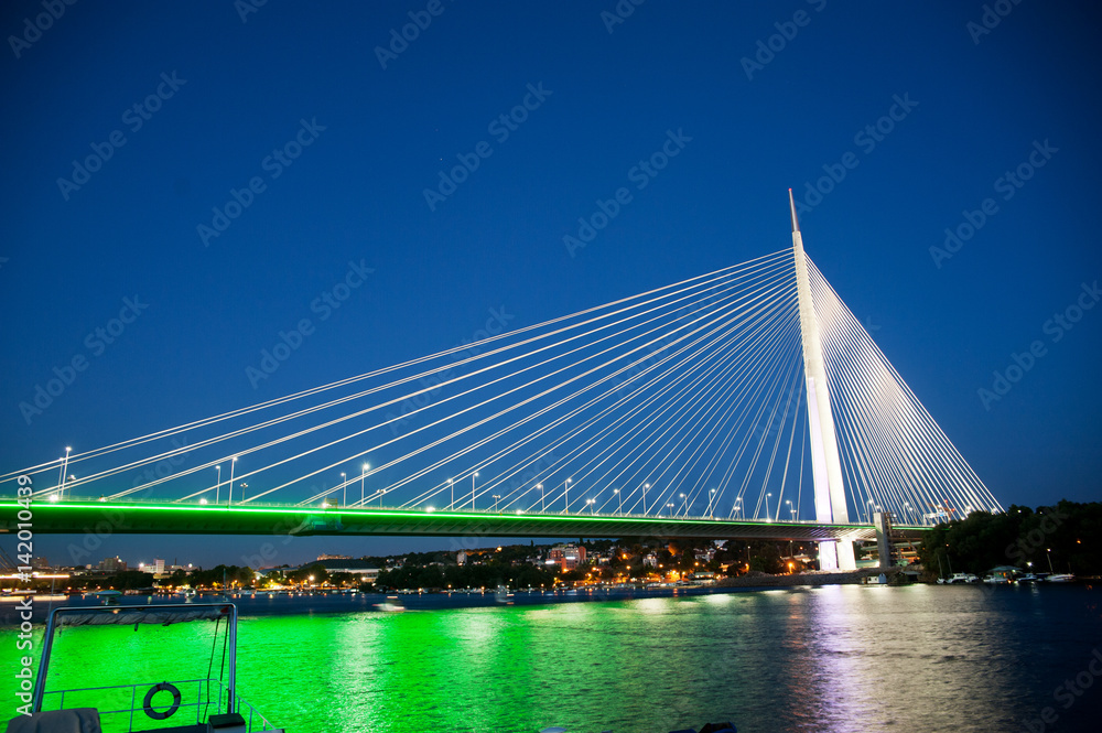 Abstract image - Suspension Bridge night lights. Dusk Skyline