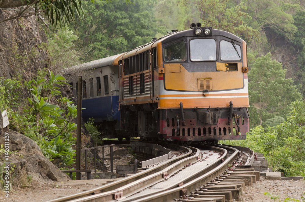 Moving train at death railway, Kanchanaburi, Thailand Moving train at death railway, Kanchanaburi, Thailand