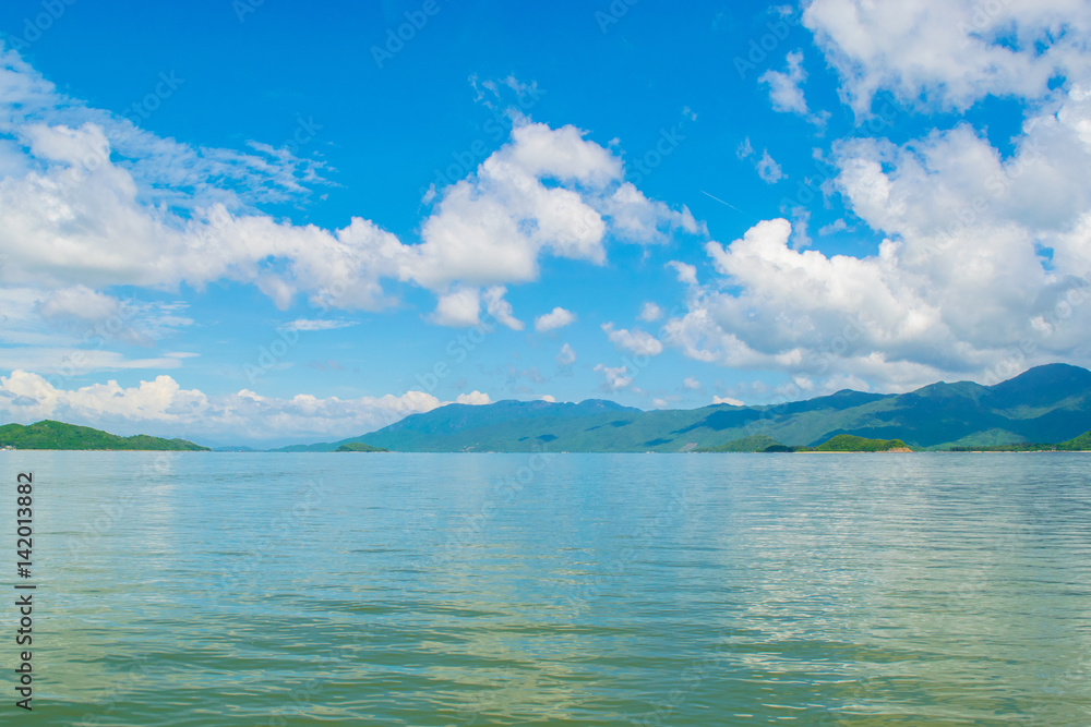 Sea shore with a paradise islands view and sky reflection -the South China sea - Vietnam Nha Trang bay