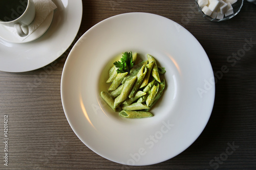 Photo of a bright green pasta