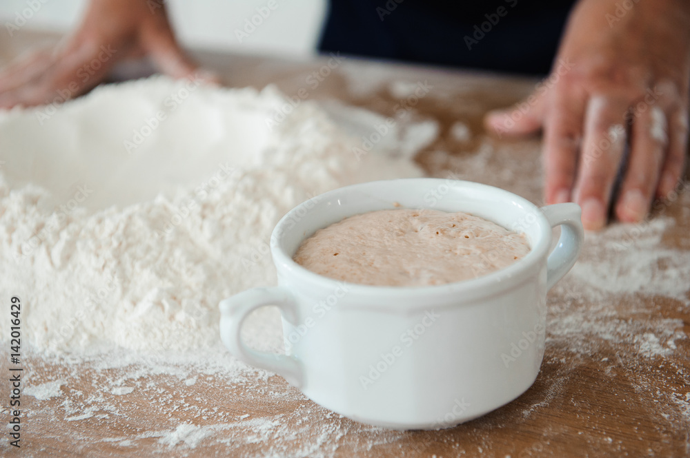 Fototapeta premium Chef preparing dough - cooking process