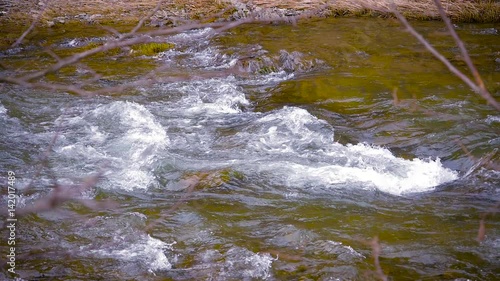 mountain river close up water slow motion photo