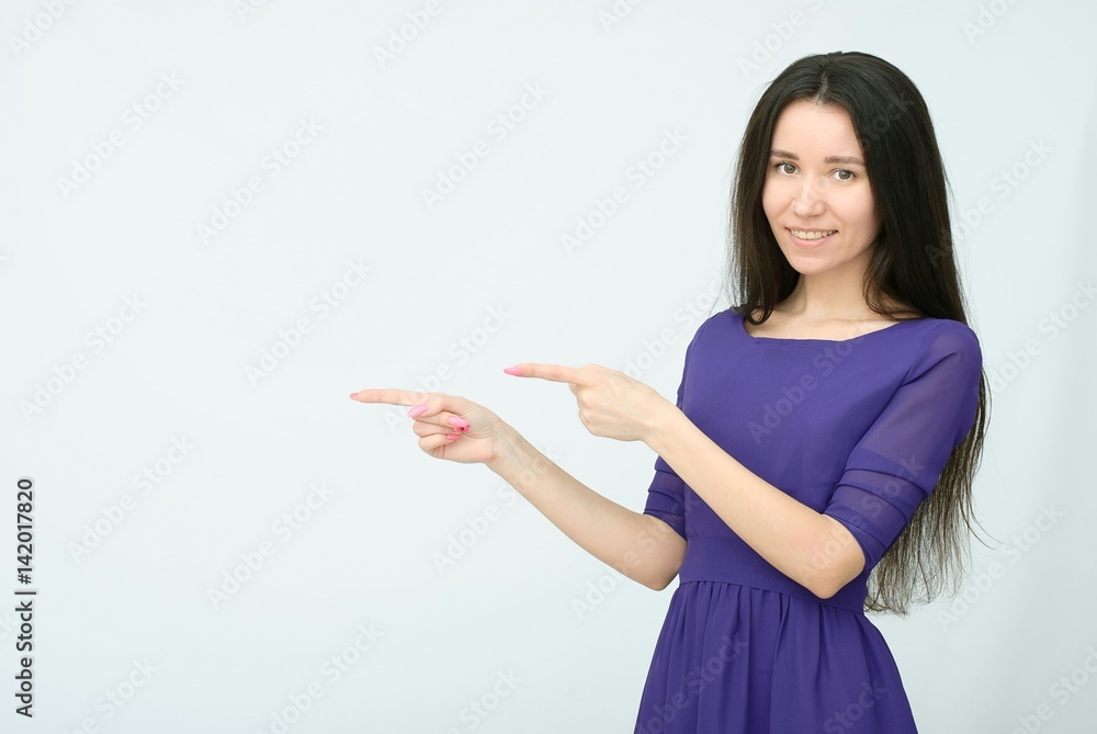 beautiful young woman standing with her hand up against white background beautiful young woman standing with her hand up against white background