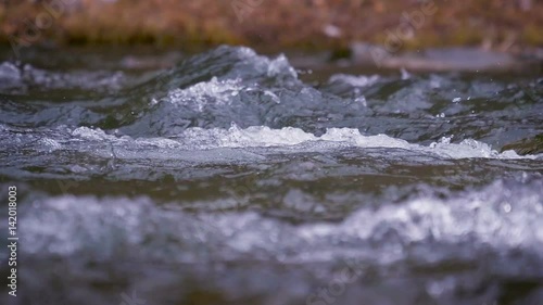 mountain river close up water slow motion photo