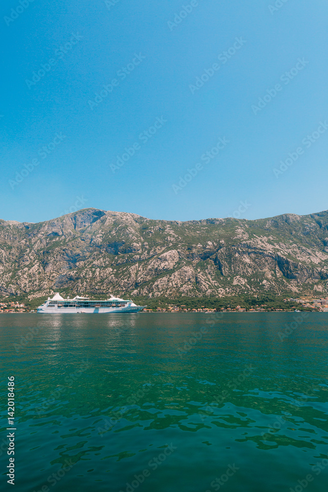 Big cruise ship in the Bay of Kotor in Montenegro. View it from Prcanj. A beautiful country to travel.