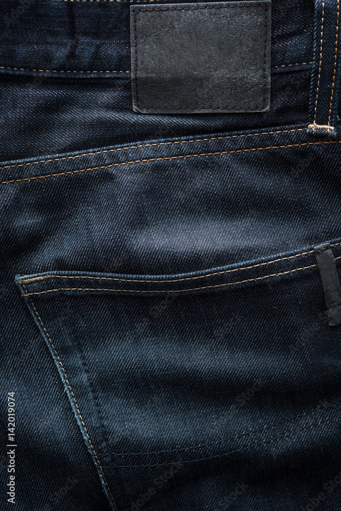 Dark blue jeans fabric background