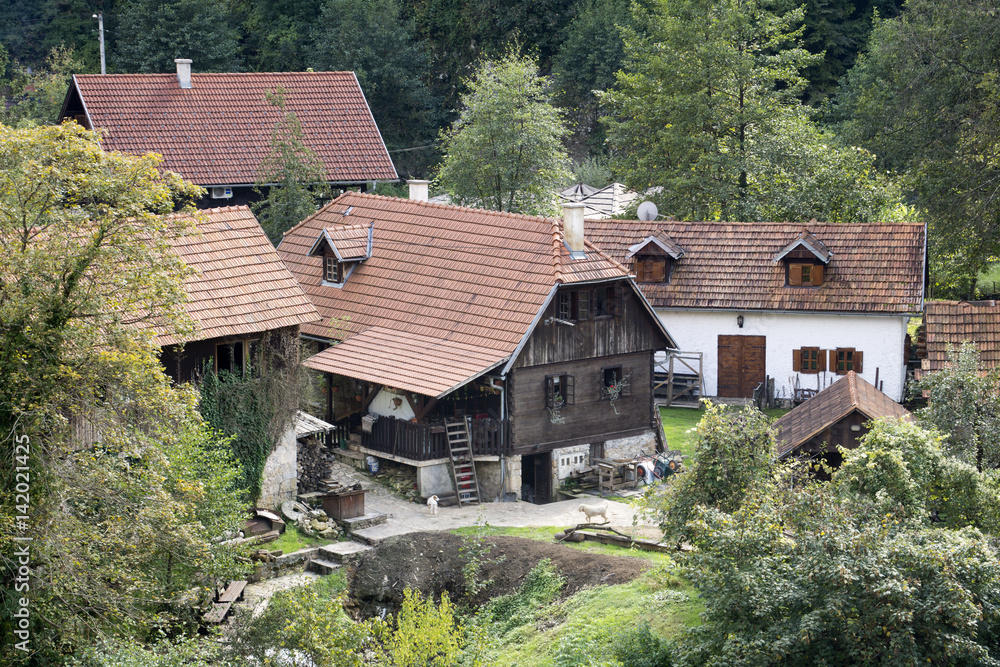 Rastoke, a picturesque village in Craotia woth wooden houses and waterfalls