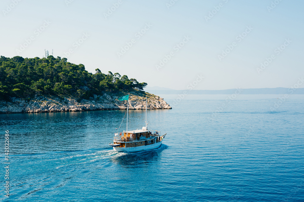 Ship with tourists, the city of Makarska, Croatia