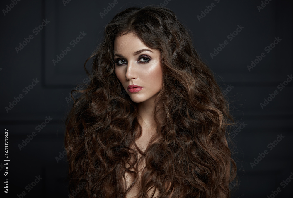 Portrait of an adorable lady with lots of fluffy curls Portrait of an adorable lady with lots of fluffy curls