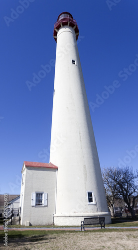 Cape May, New Jersey lighthouse against blue sky.