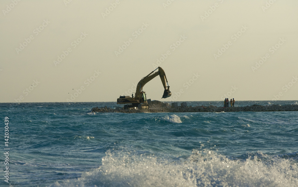 Fototapeta premium Yellow Excavator at Work
