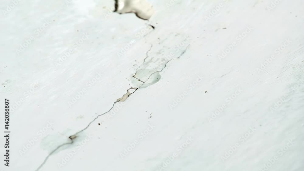 Water drips from ceiling. Faulty water supply in highrise building