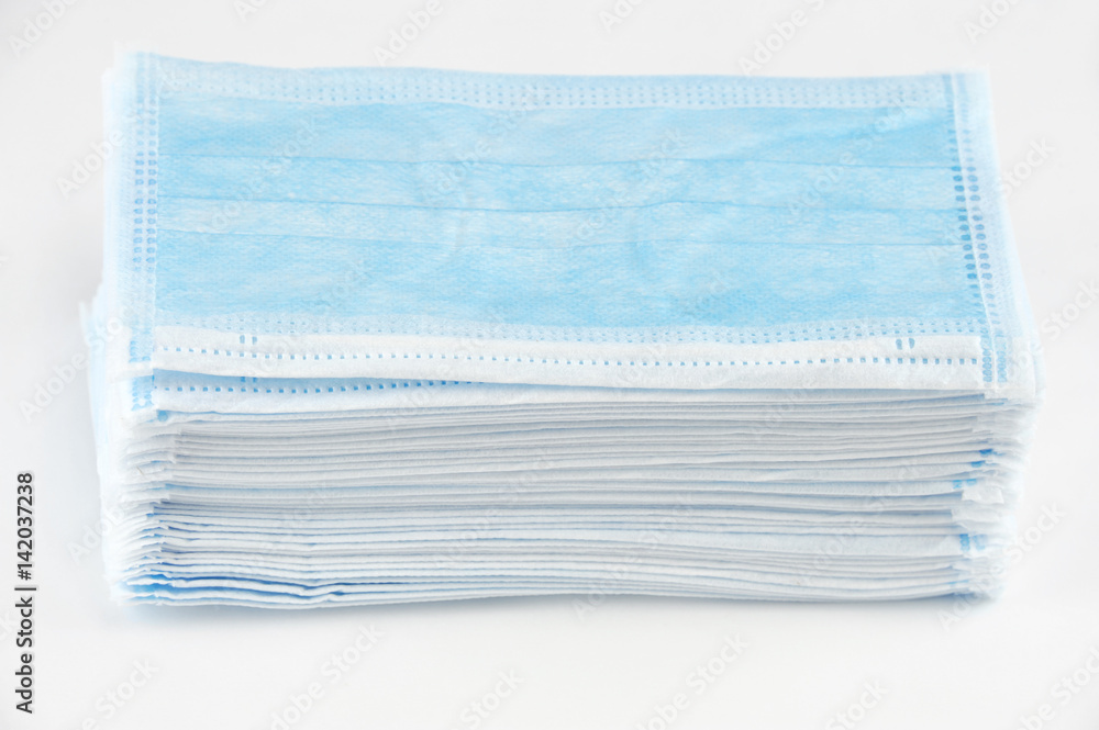 stack medical ear-loop mask isolated on white background stack medical ear-loop mask isolated on white background
