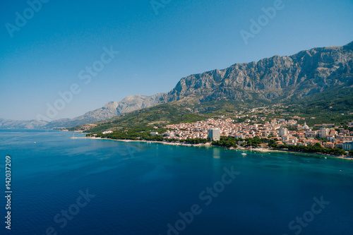 Aerial Photo drone Makarska, Croatia. Coast city, sea and mountains